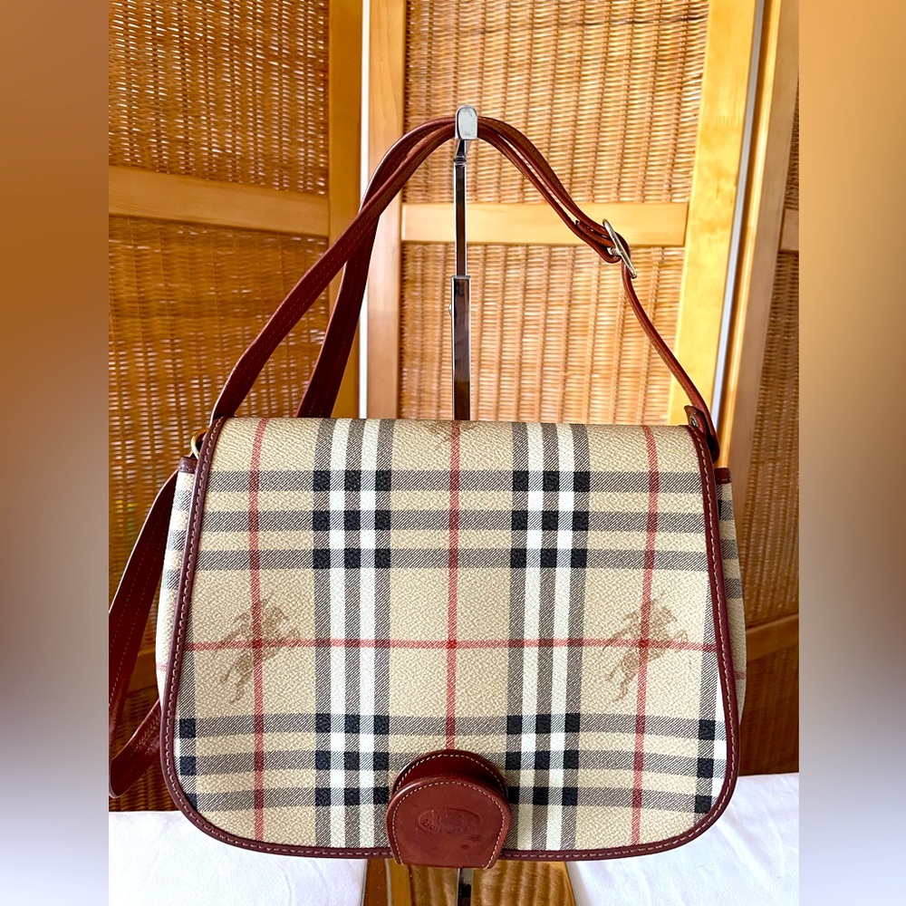 Burberrys Saddle Bag in Coated Canvas with the Burberry Classic Check Print